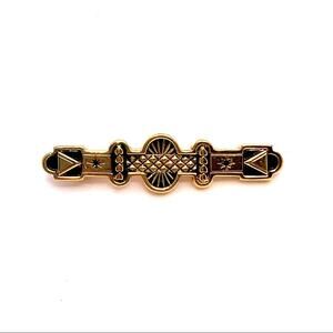 Art Deco gold and black pin brooch